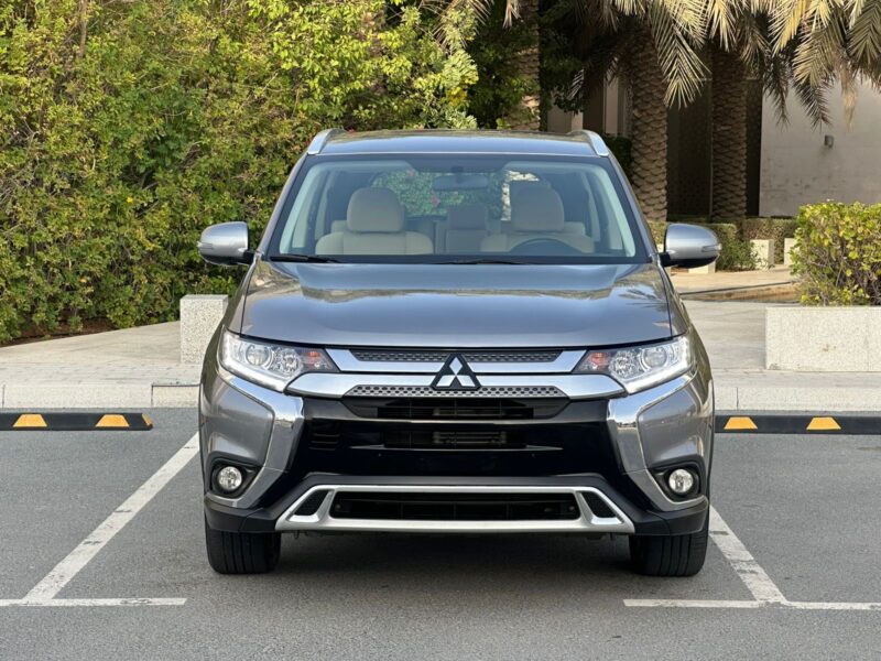 Gcc Mitsubishi Outlander GLX 2021 Model 2.4L 7 Seater 4WD Full service in showroom : Titanium Grey Color 63445 kms Available with Cash & Bank finance.
